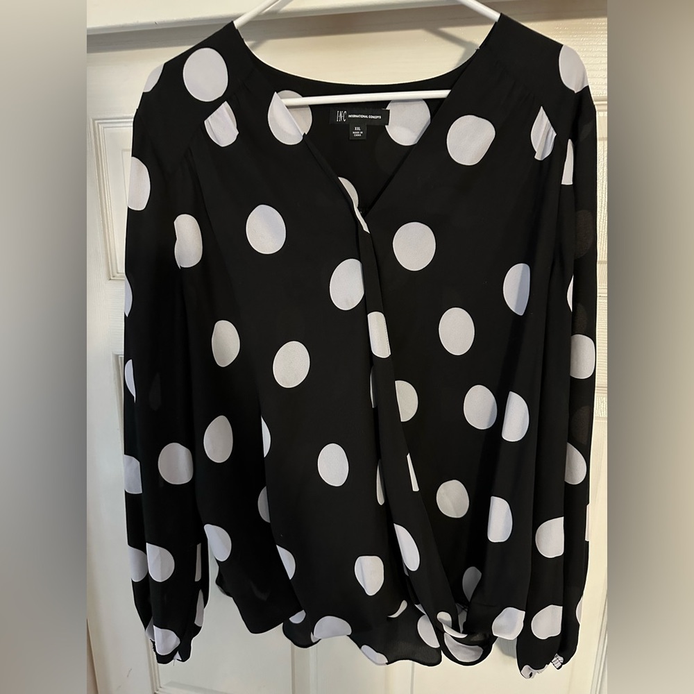 INC blouse in good condition. Gently worn a few times. Very flattering fit.